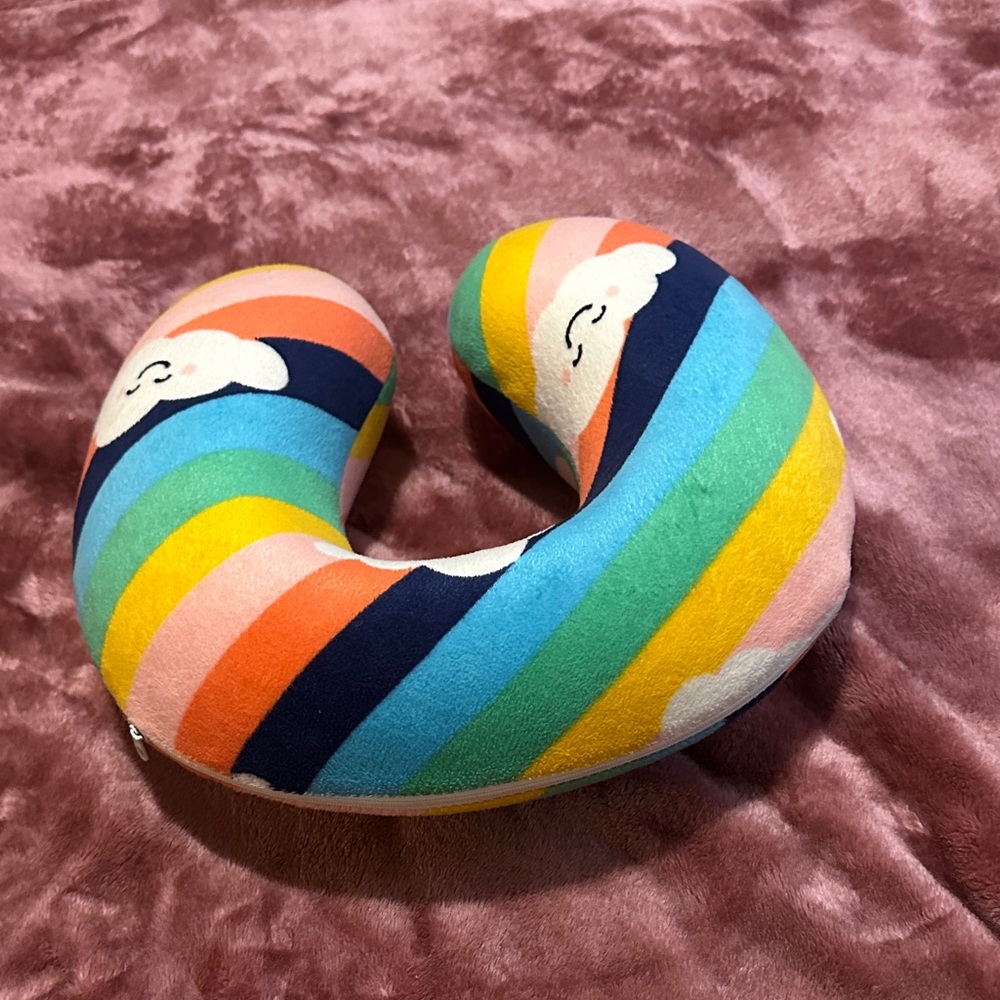 Vibrant Striped Neck Pillow with Clouds